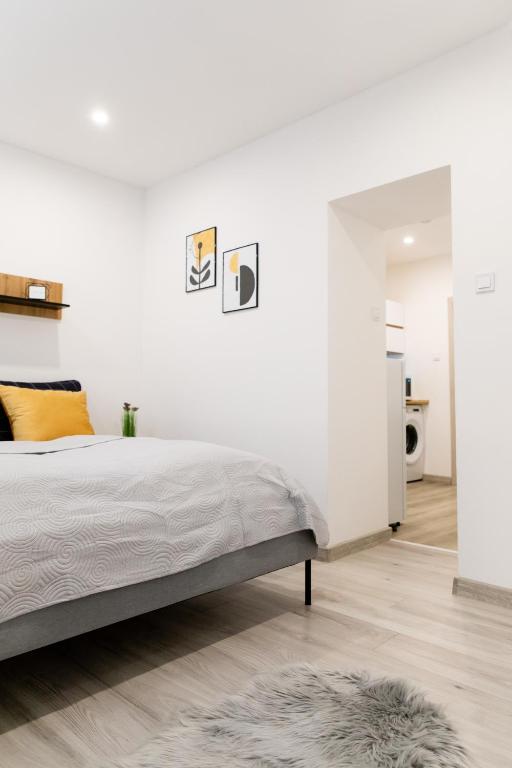 Postel nebo postele na pokoji v ubytování The Central Border Premium Apartment