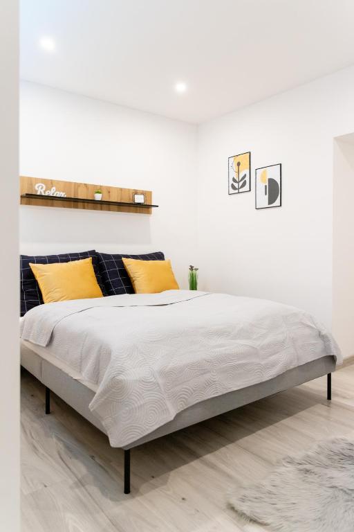 Postel nebo postele na pokoji v ubytování The Central Border Premium Apartment