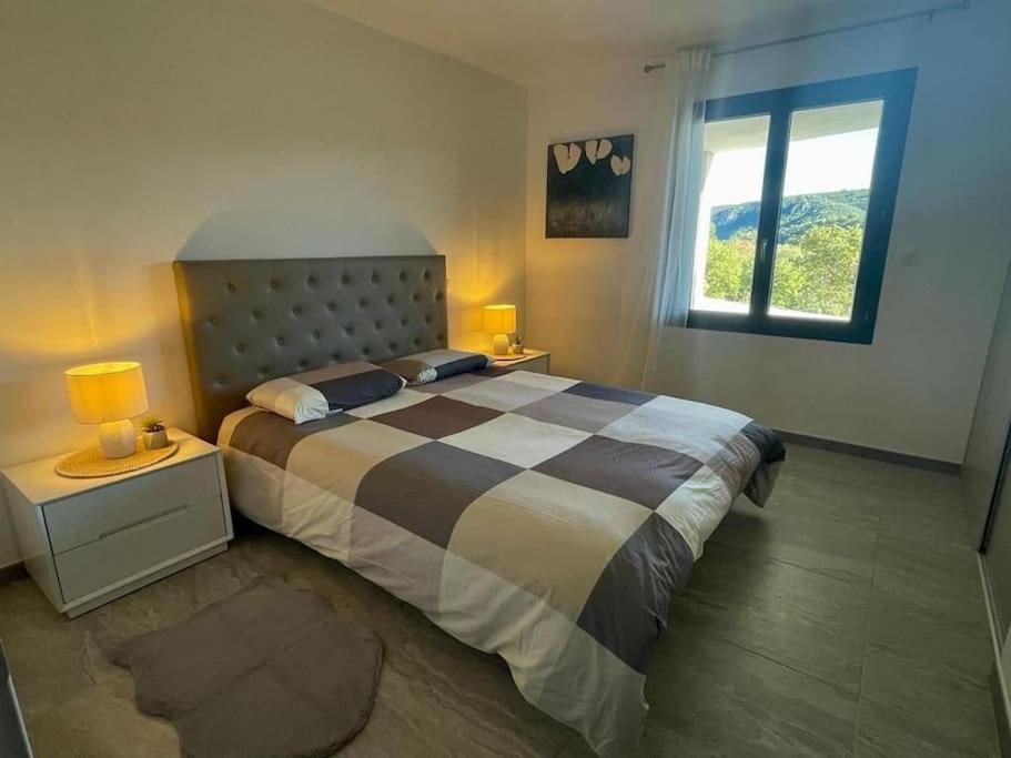 Postel nebo postele na pokoji v ubytování Cœur de provence