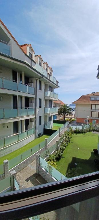 a view from a window of a building at La Escollera Noja in Noja