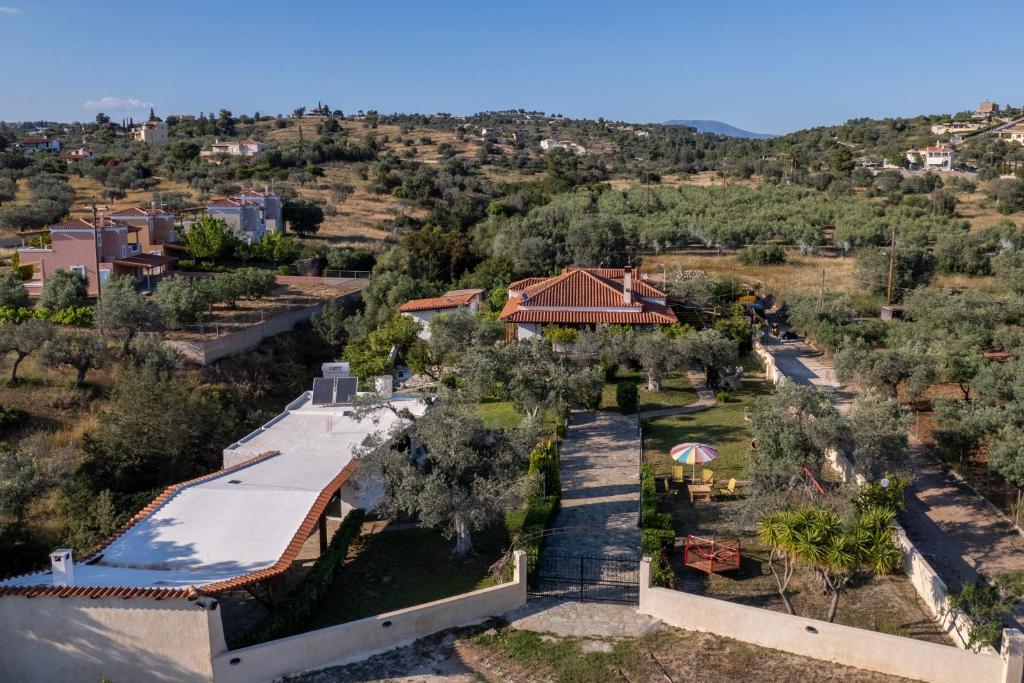 an aerial view of a house with a yard at Green Garden in Porto Heli