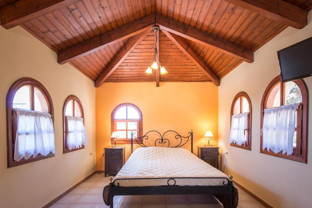 Postel nebo postele na pokoji v ubytování Villa Eora