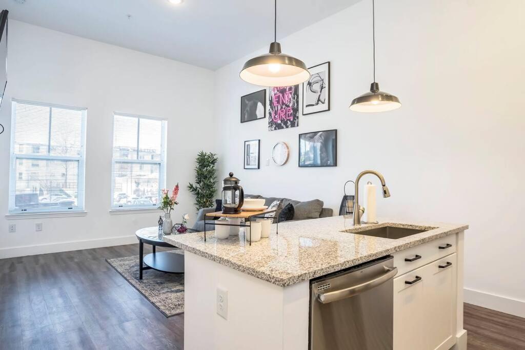 a kitchen with a sink and a counter top at Cozy Atlanta Apartment in Atlanta