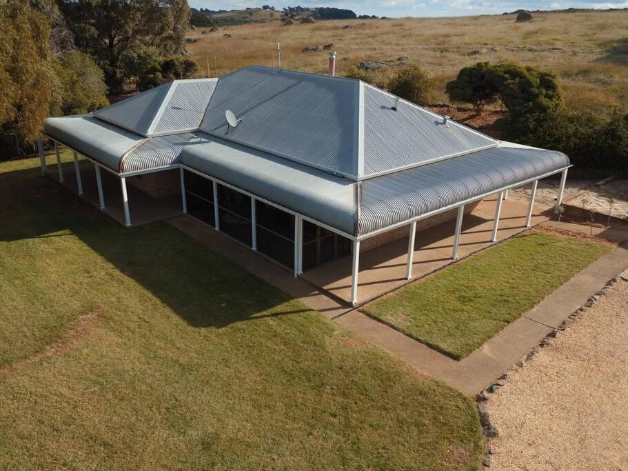 an overhead view of a building with a metal roof at Griffin Getaway in Orange