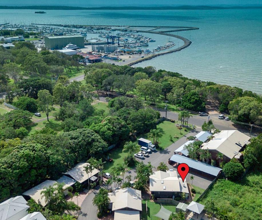 an aerial view of a park next to a body of water at Snapper Villa - Seaside in Urangan