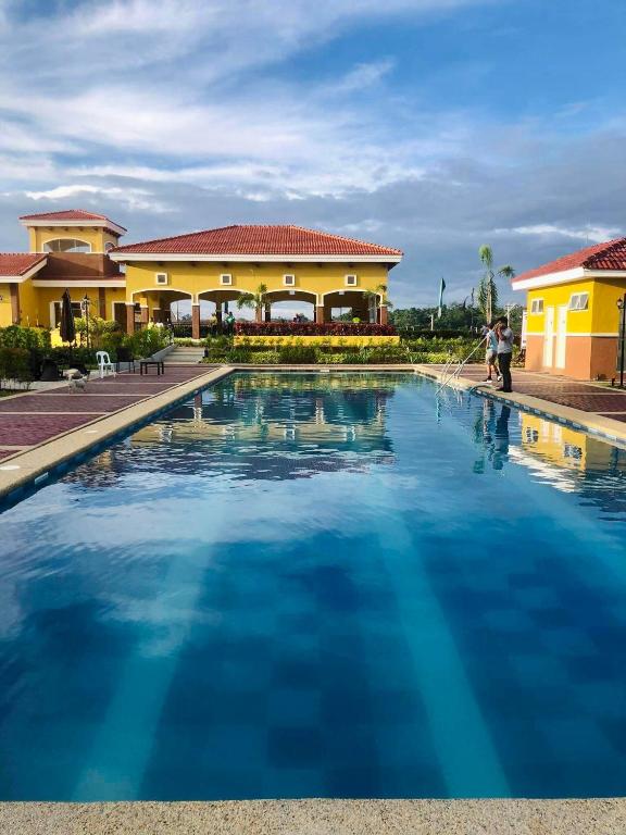 a large swimming pool in front of a house at Z House of Guest- Airport Davao in Davao City