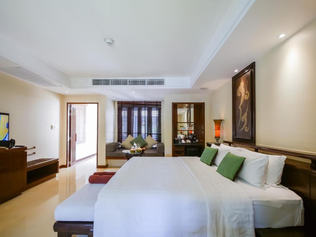 Postel nebo postele na pokoji v ubytování Paradox Resort Phuket