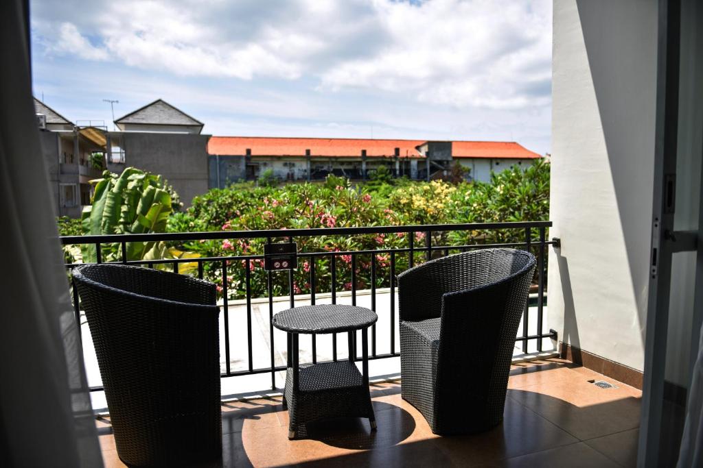 Balkón nebo terasa v ubytování The Kana Kuta Hotel