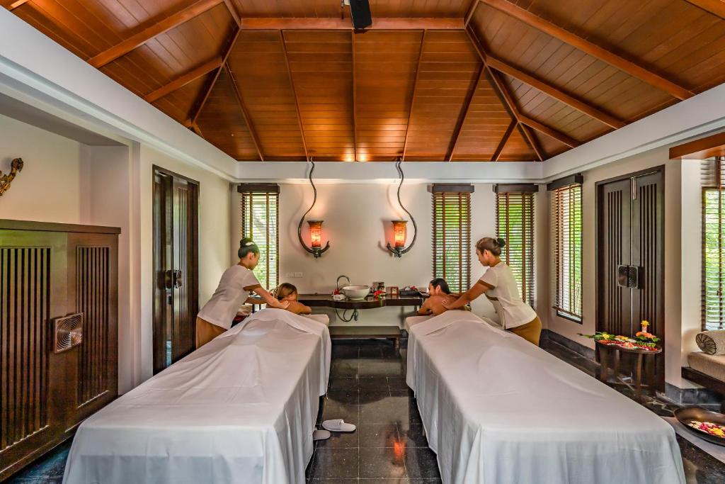 Postel nebo postele na pokoji v ubytování Paradox Resort Phuket