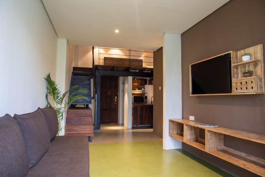 TV a/nebo společenská místnost v ubytování Lake Avenue Hotel Kandy