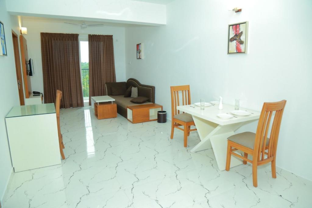 Posezení v ubytování Utsavam Hotel Apartments