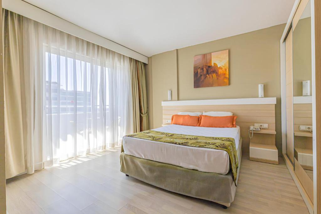 Postel nebo postele na pokoji v ubytování Akdora Elite Hotel & Spa
