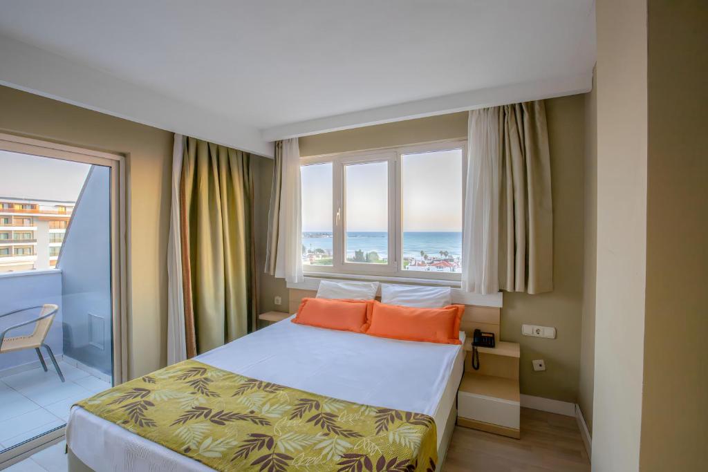 Postel nebo postele na pokoji v ubytování Akdora Elite Hotel & Spa