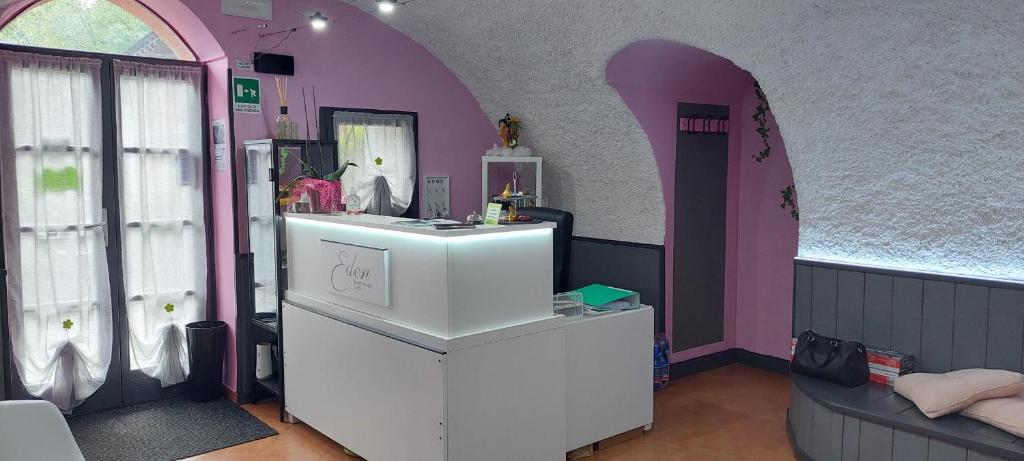Posezení v ubytování Eden Guest House Colico