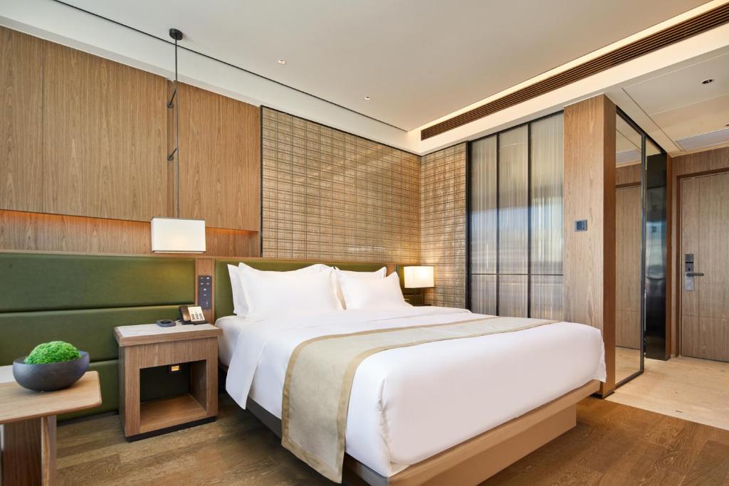 Fotografie z fotogalerie ubytování Dongguan Tangxia Huaman Hotel v destinaci Tung-kuan