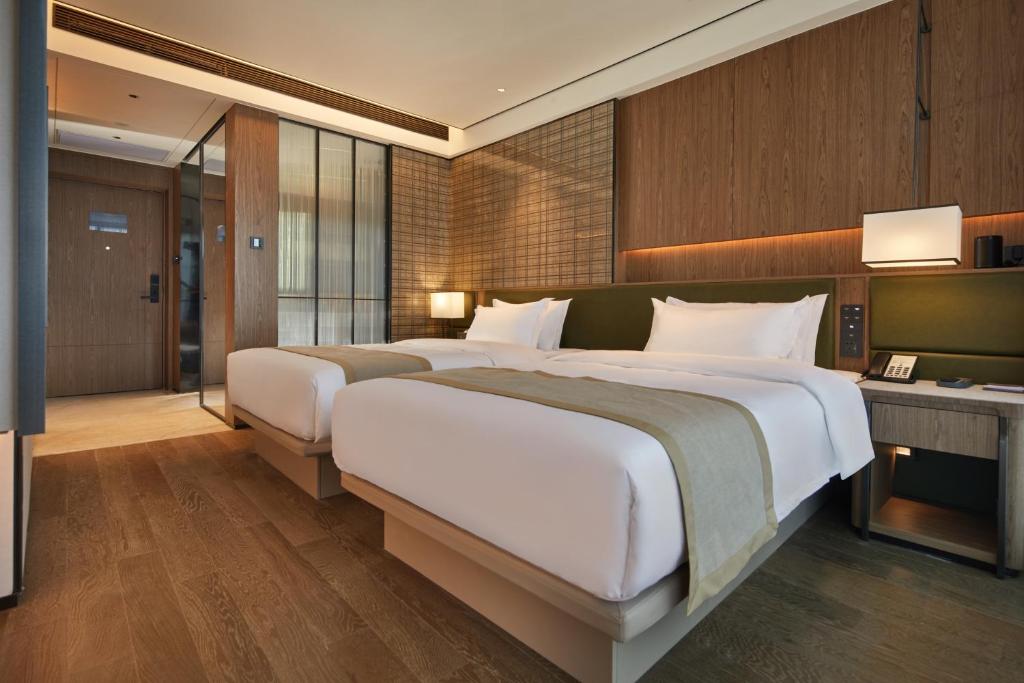 Fotografie z fotogalerie ubytování Dongguan Tangxia Huaman Hotel v destinaci Tung-kuan