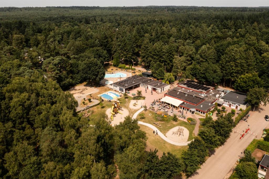 an aerial view of a house in the woods at RCN de Jagerstee in Epe