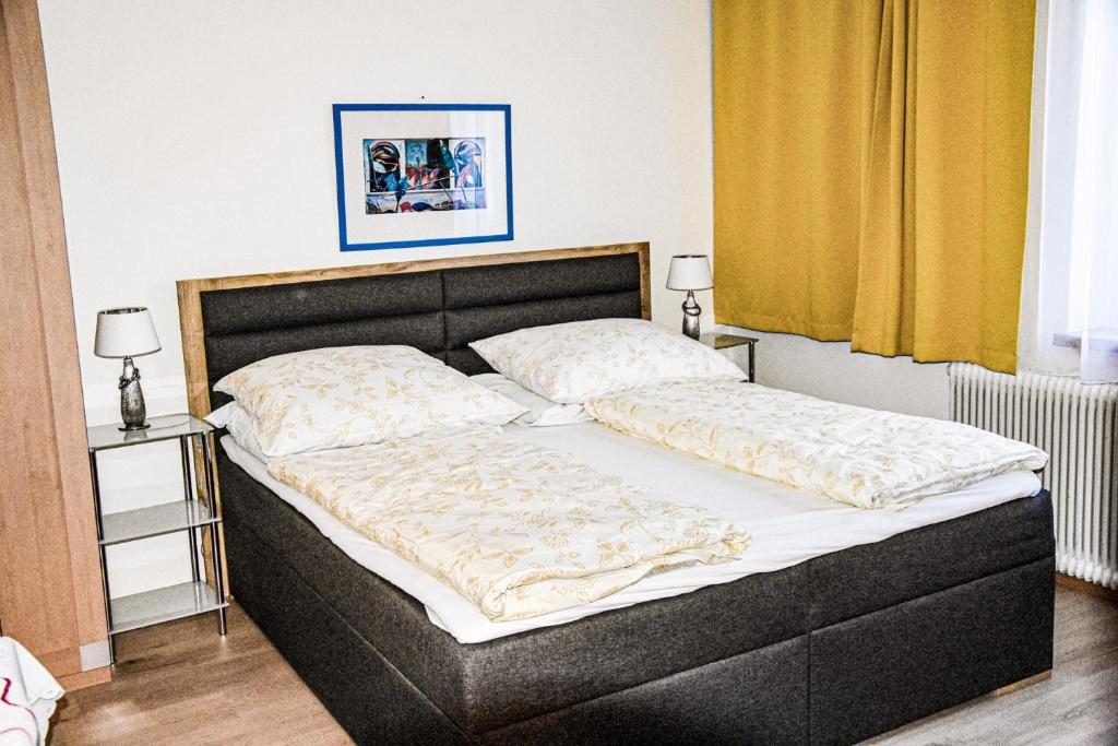Postel nebo postele na pokoji v ubytování Hotel Reinisch
