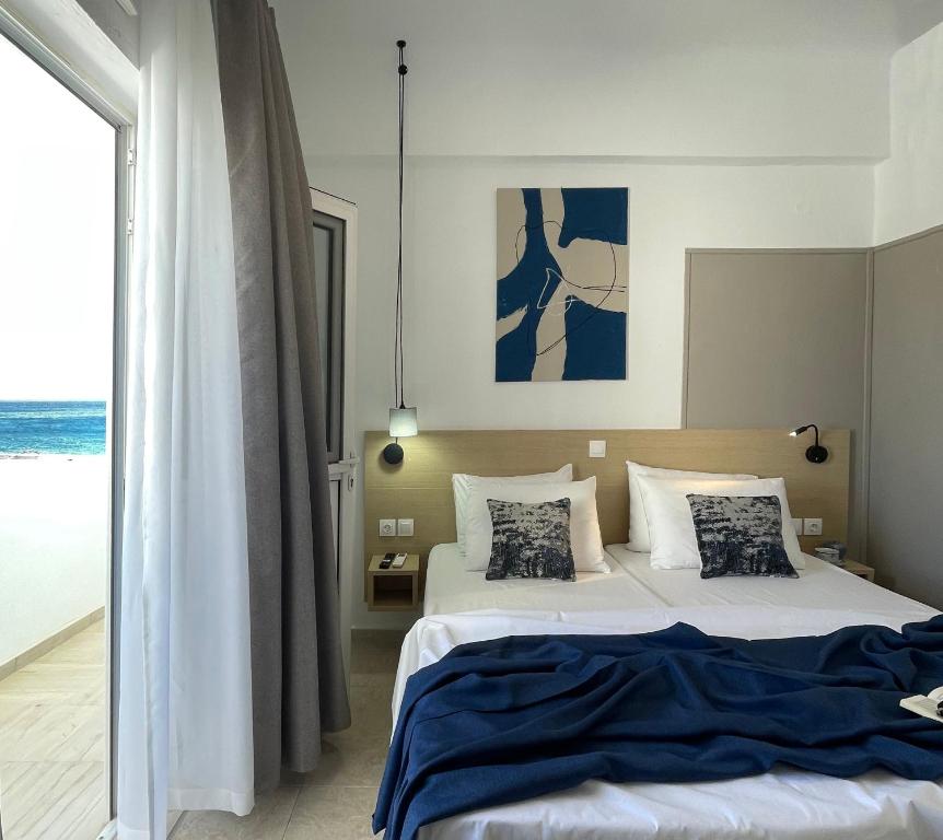 Ένα ή περισσότερα κρεβάτια σε δωμάτιο στο Vista Mare
