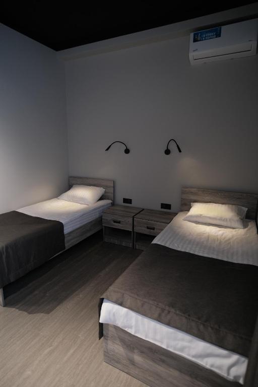 Postel nebo postele na pokoji v ubytování Vip Avtim hotel