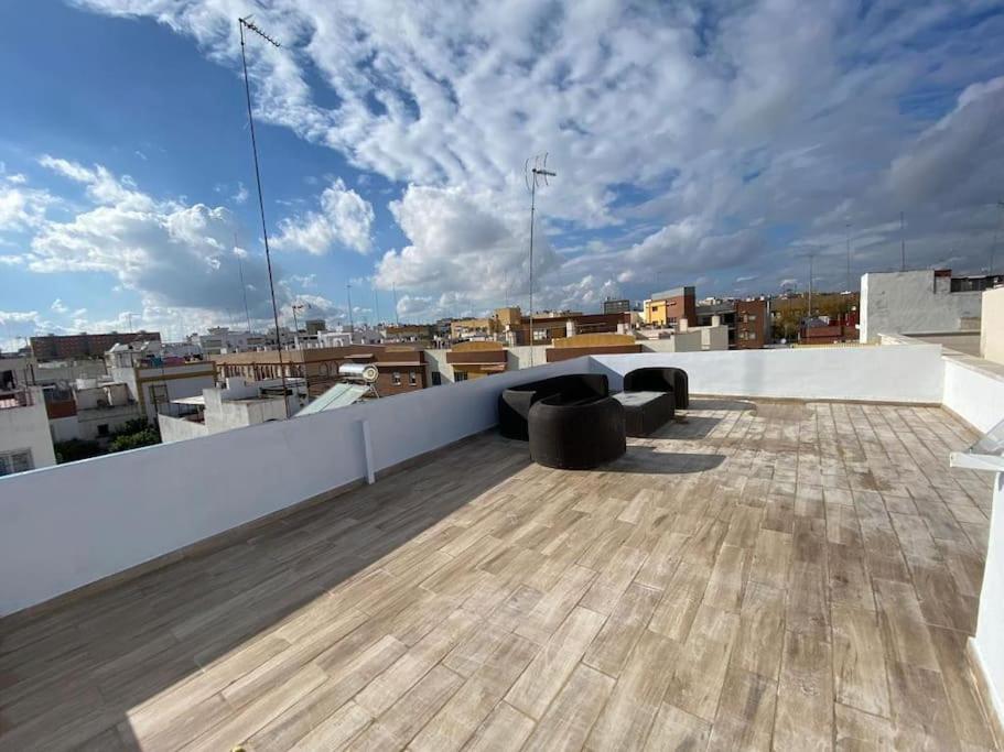 a rooftop with a view of a city at bajo en casa unifamiliar terraza in Seville