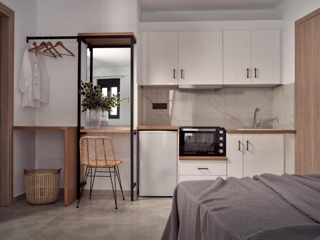 A kitchen or kitchenette at Giannoulis City Apartments