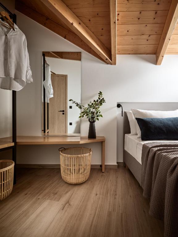A bed or beds in a room at Giannoulis City Apartments