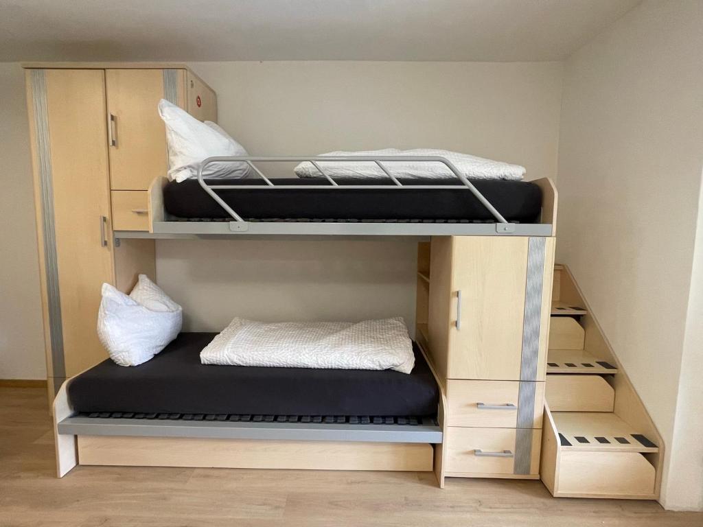 Postel nebo postele na pokoji v ubytování Haus zum Glück