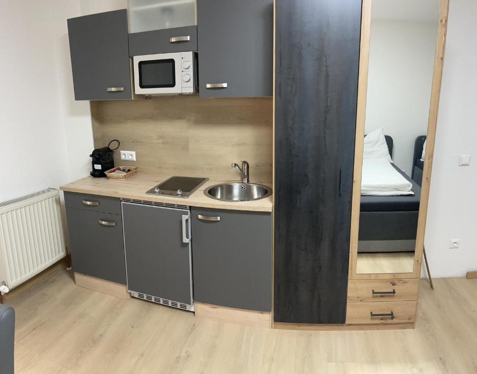 Kuchyň nebo kuchyňský kout v ubytování Haus zum Glück