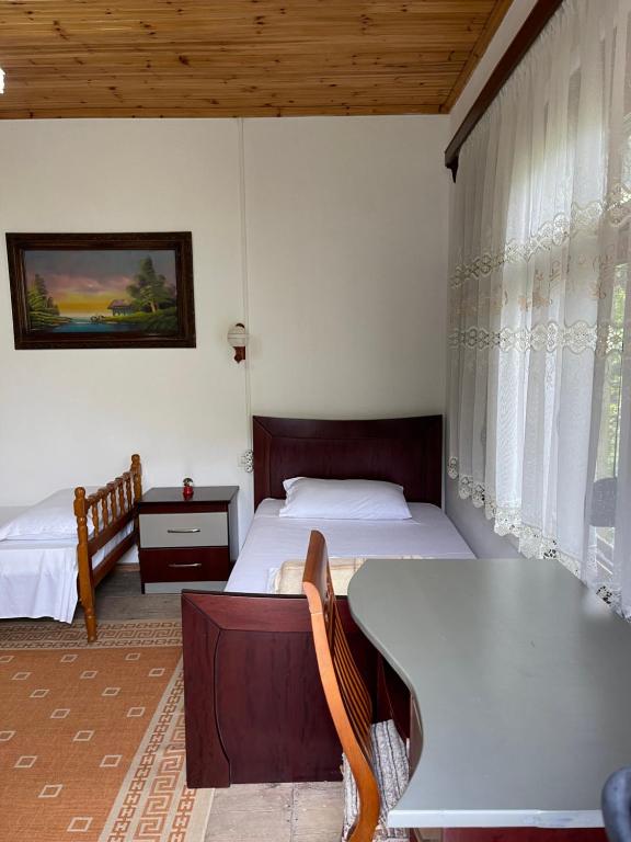 Postel nebo postele na pokoji v ubytování Guest House Bakuli