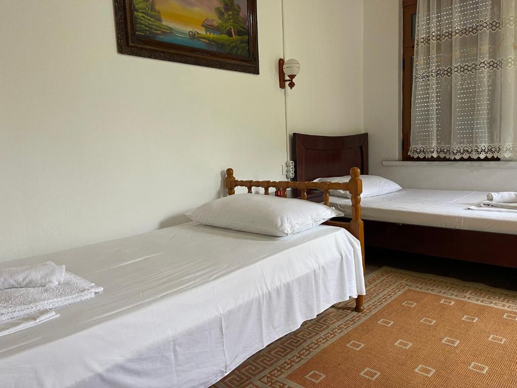 Postel nebo postele na pokoji v ubytování Guest House Bakuli
