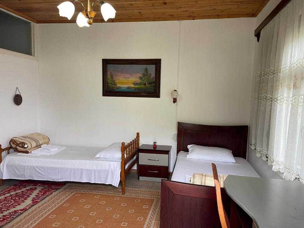 Postel nebo postele na pokoji v ubytování Guest House Bakuli