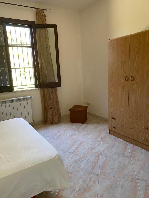Posteľ alebo postele v izbe v ubytovaní Villa singola a 1300 mt dal mare