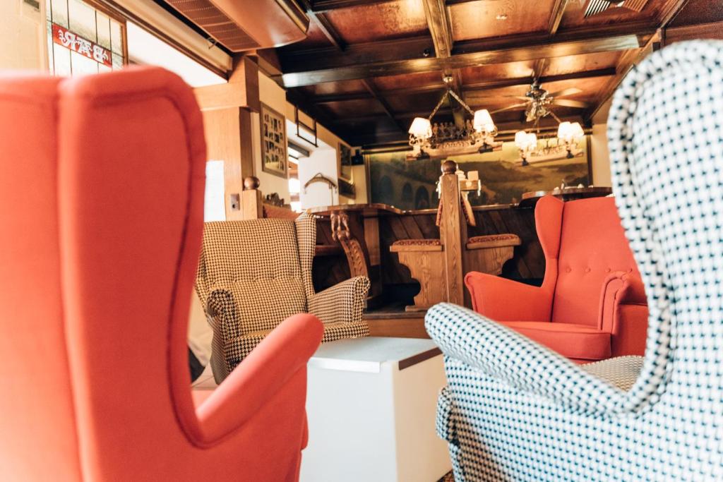 Posezení v ubytování AKZENT Hotel Berg's Alte Bauernschänke- Wellness und Wein