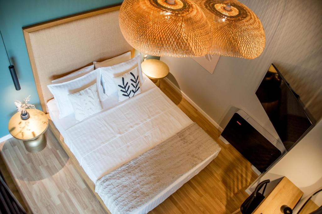 Voodi või voodid majutusasutuse Ambient Living toas