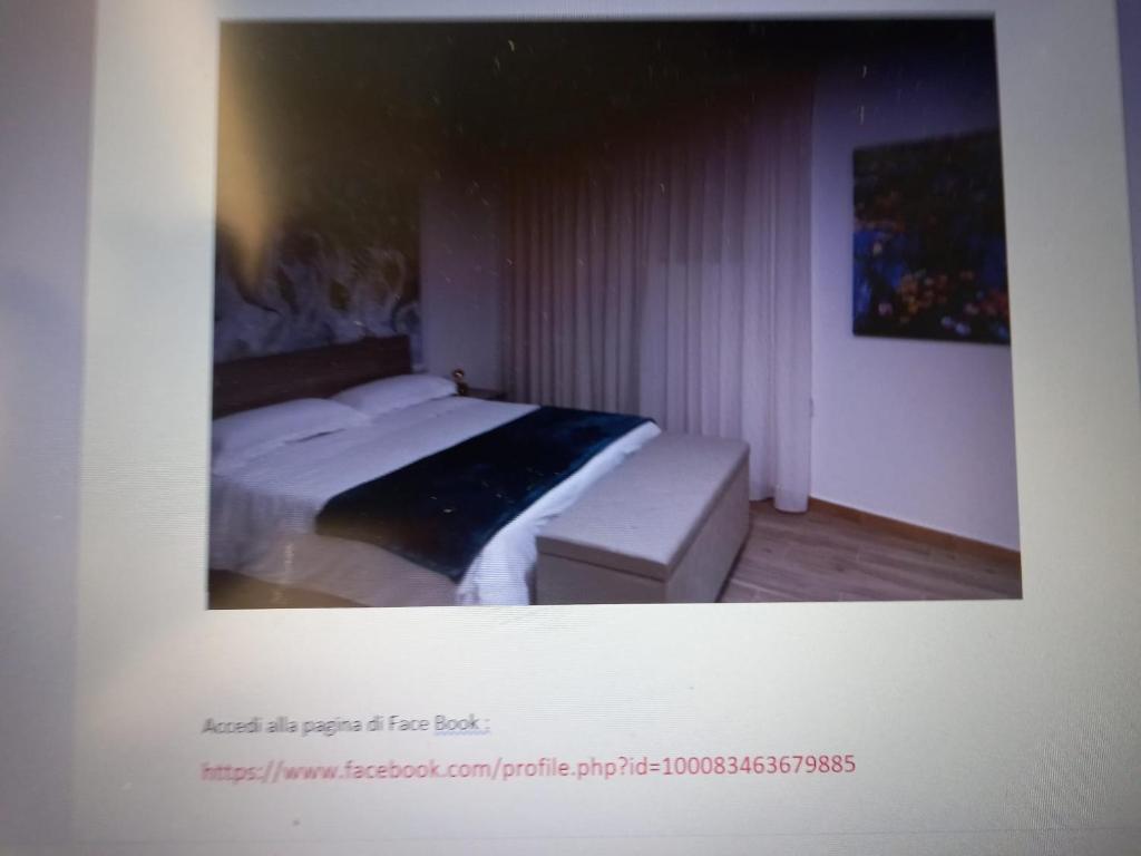 Łóżko lub łóżka w pokoju w obiekcie Casa dei Tre Re