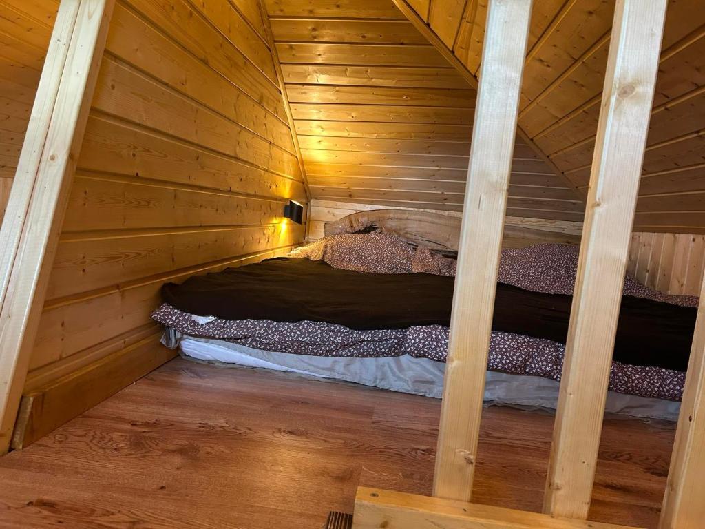 Postel nebo postele na pokoji v ubytování Domki całoroczne nad zalewem