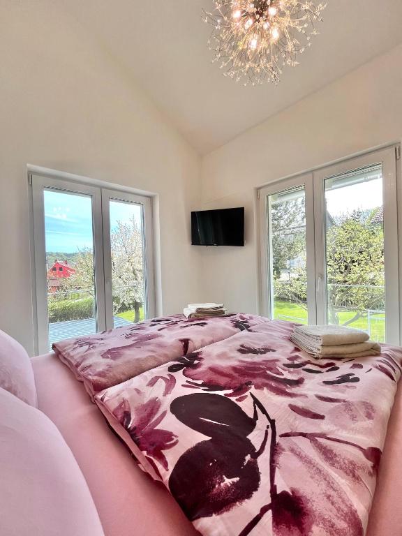 Postel nebo postele na pokoji v ubytování Ferienhaus „Am Sandstein“