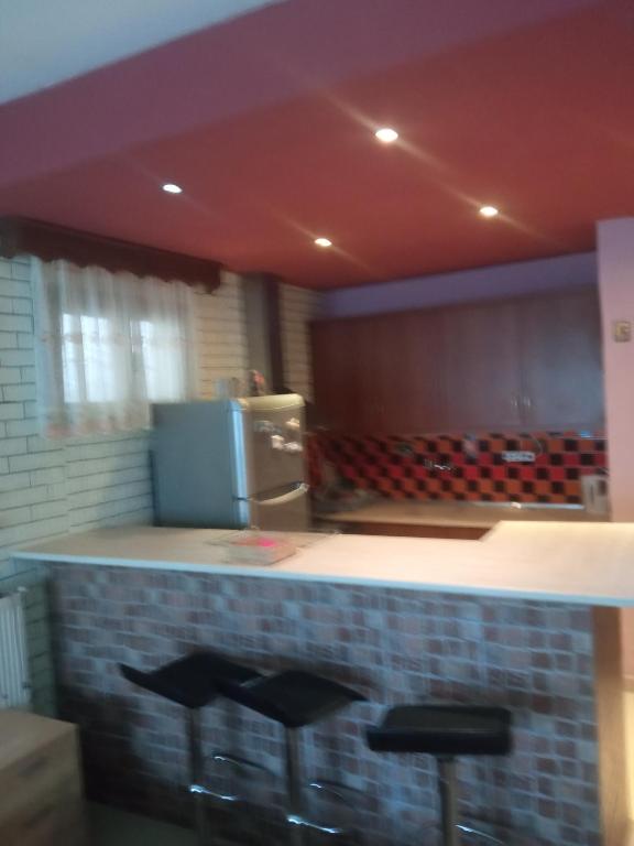 Kuchyň nebo kuchyňský kout v ubytování argiri appartments