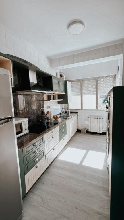 Kuchnia lub aneks kuchenny w obiekcie Piso BOIRO PLAYA Robustiano