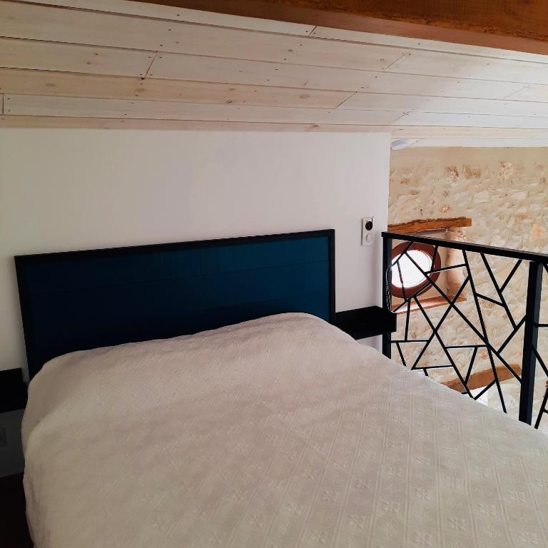 Posteľ alebo postele v izbe v ubytovaní Le Cabanon des Lavandes entre Mont Ventoux et Luberon
