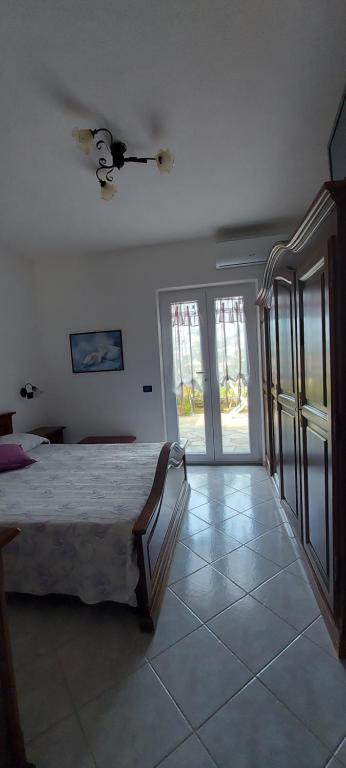 Postel nebo postele na pokoji v ubytování Villa Symphony Sea view