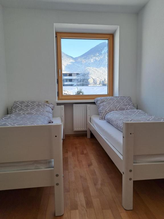 Postel nebo postele na pokoji v ubytování Bergpanorama