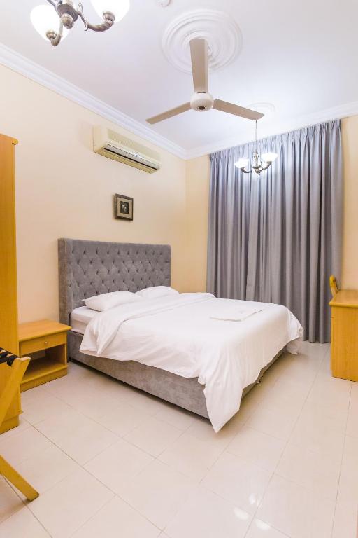 Postel nebo postele na pokoji v ubytování Esra Hotel Apartment