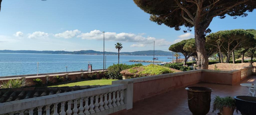 a view of the ocean from a balcony at Hotel Martinengo in Sainte-Maxime