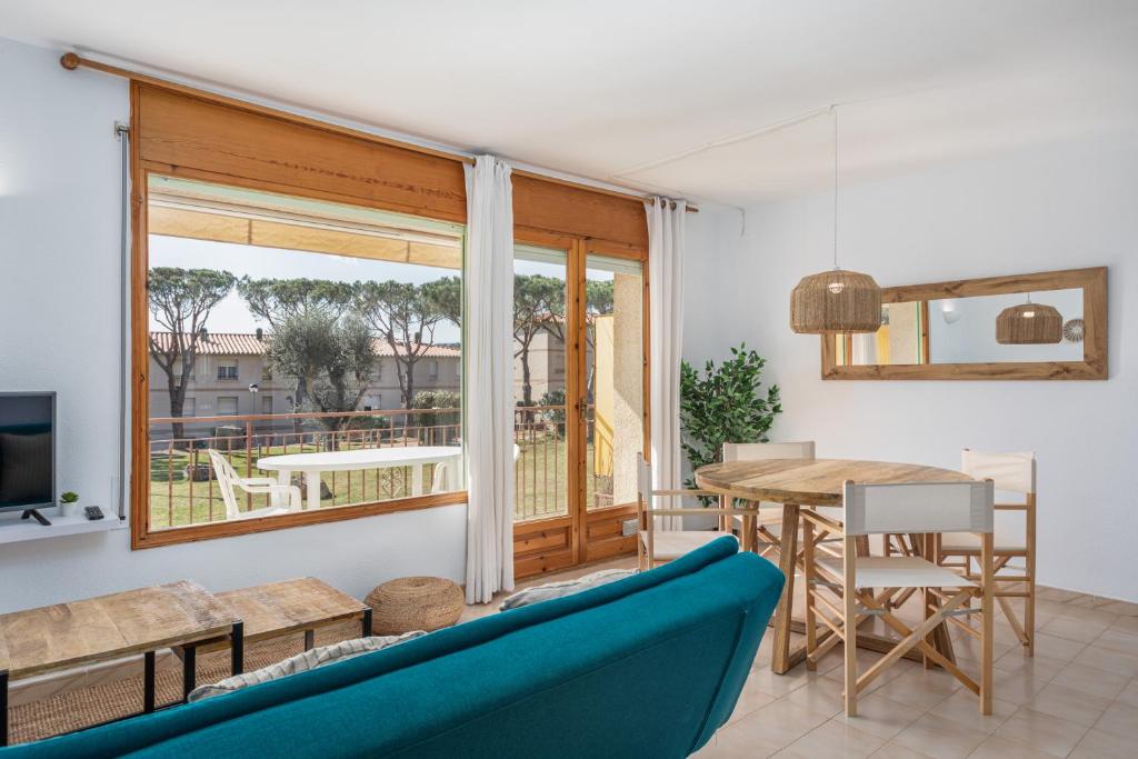 Posedenie v ubytovaní Apartamentos CASA MAREA La Fosca parking y piscina