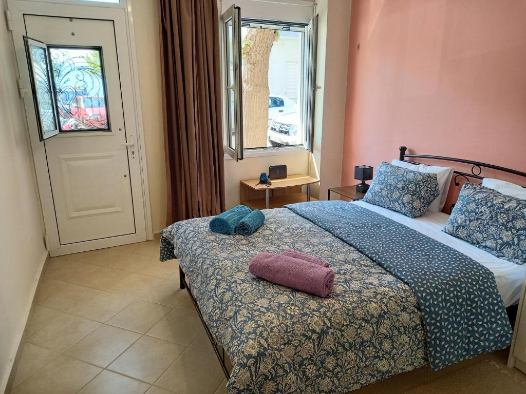 Postel nebo postele na pokoji v ubytování Pel House