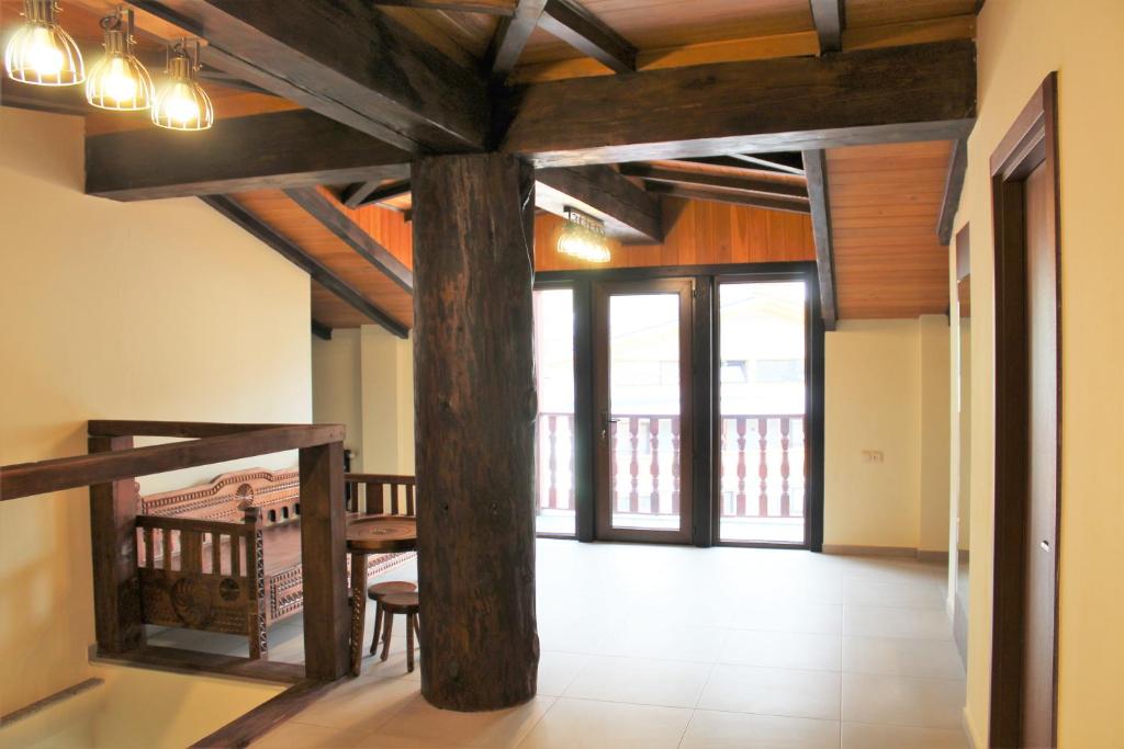 Postel nebo postele na pokoji v ubytování Hotel Mansarda Mestia