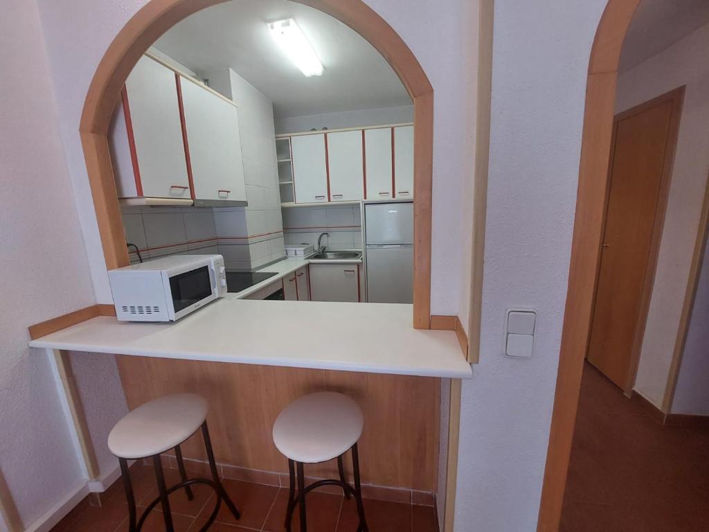 A kitchen or kitchenette at Rentalmar Cordoba - Sevilla - Jerez