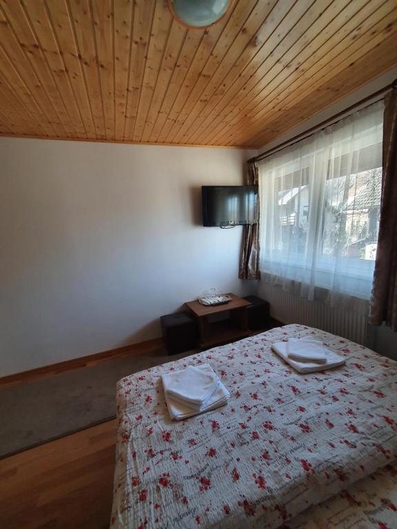 Postel nebo postele na pokoji v ubytování Casa Miruna & Noris